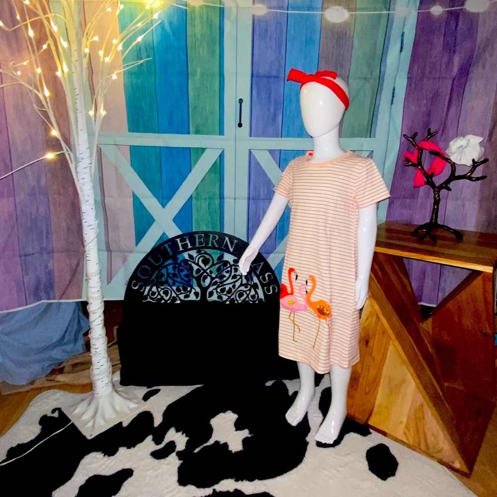Child’s flamingo dress.